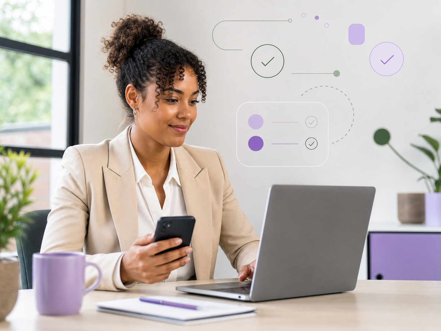 A letting agent reviewing applicant progress on a laptop and phone